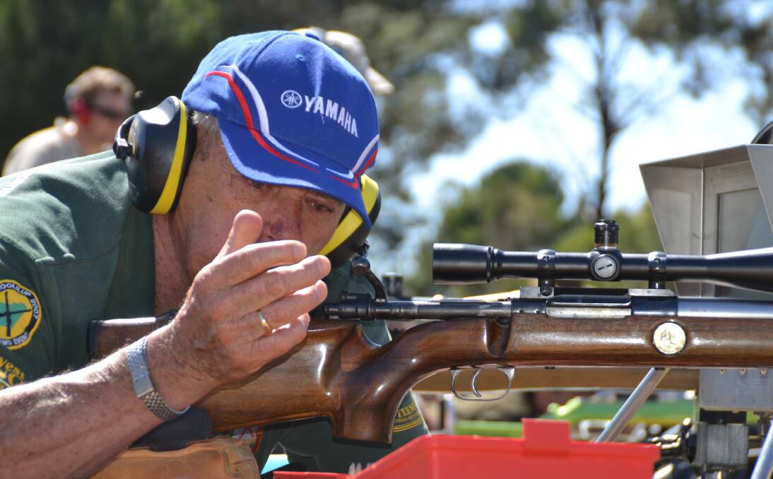 A Busselton shooter who shares the range expels a spent shell casing by using the bolt action on the rifle which only takes one bullet at a time.