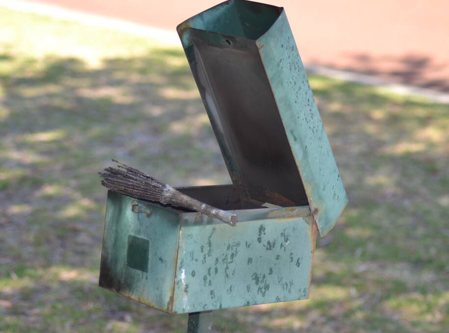 Heated: Dave Harrison's letterbox was left burnt out by a prank pulled on his on Saturday night and he now warns about the dangers of fire.