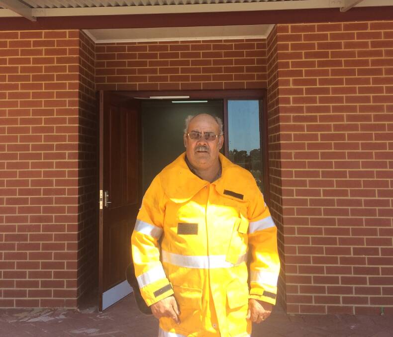 New beginnings: Yarloop Volunteer Bushfire Brigade captain Daryle Wilson at the entry of the new fire station, that is set to reopen in the next few weeks. Photo supplied. 