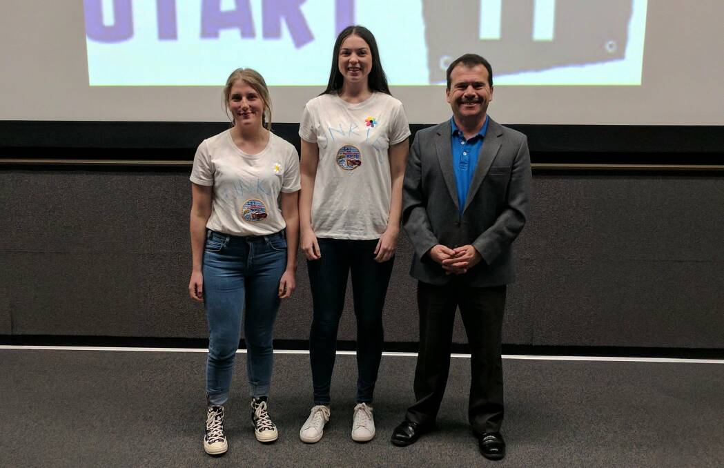 Bunbury Cathedral Grammar School students Joanna Otter and Lily Roberts with their business mentor David Byatt from Moshi Moshi Marketing. 