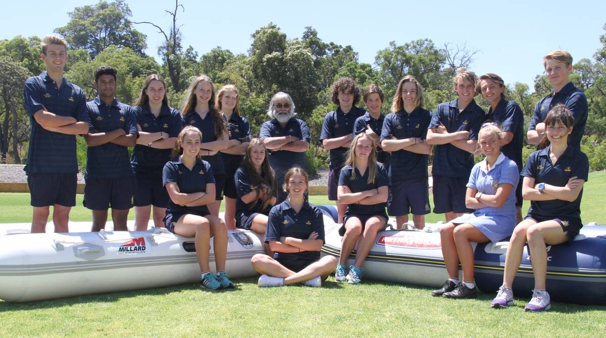 Bunbury Cathedral Grammar School has been recognised as the state's first Swimming WA endorsed school. Pictured is the school's swimming team with their coach Bob Marshall. 
