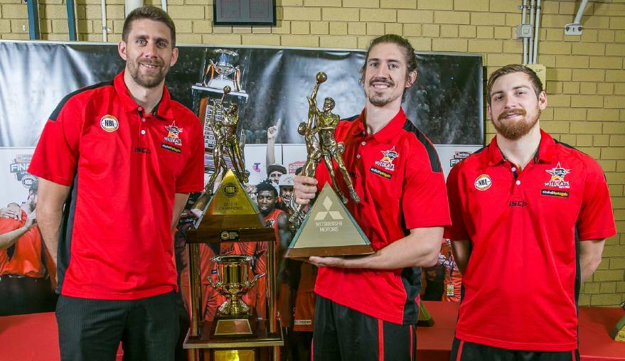 Perth Wildcats players Tom Jervis, Greg Hire and Corban Wroe visited the South West last year to show off their trophies and skills. Photo: Ashley Pearce.