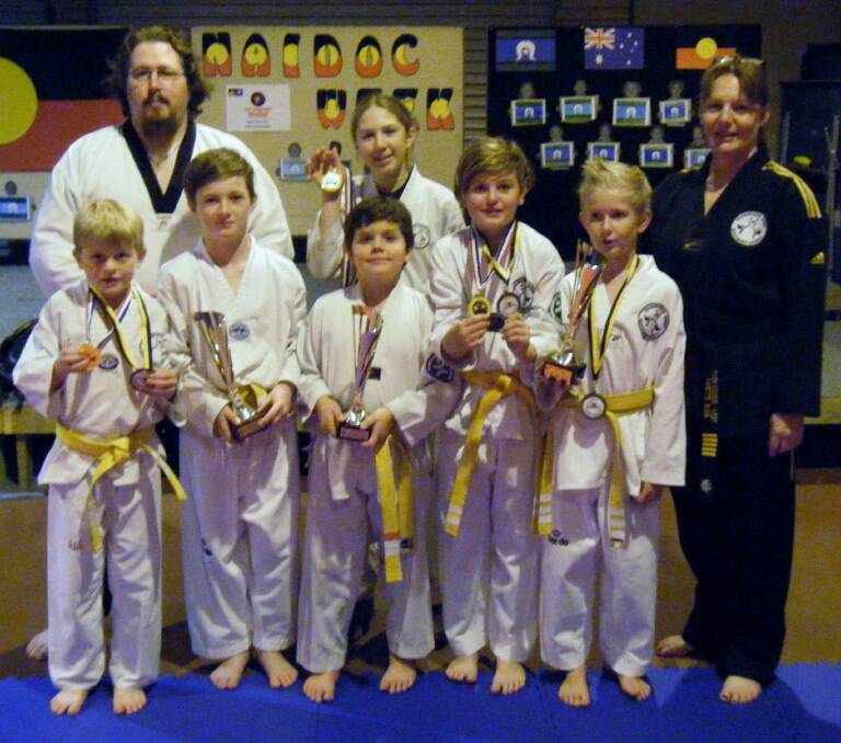 Taekwondo West Eaton instructors Kim Walter and Annette Buss with students Kobe McLaren, Brayden Matheson, Harry Kane, Katey Walter, Aiden McLaren and Nayte Wright at the state team selection trials in Perth. 