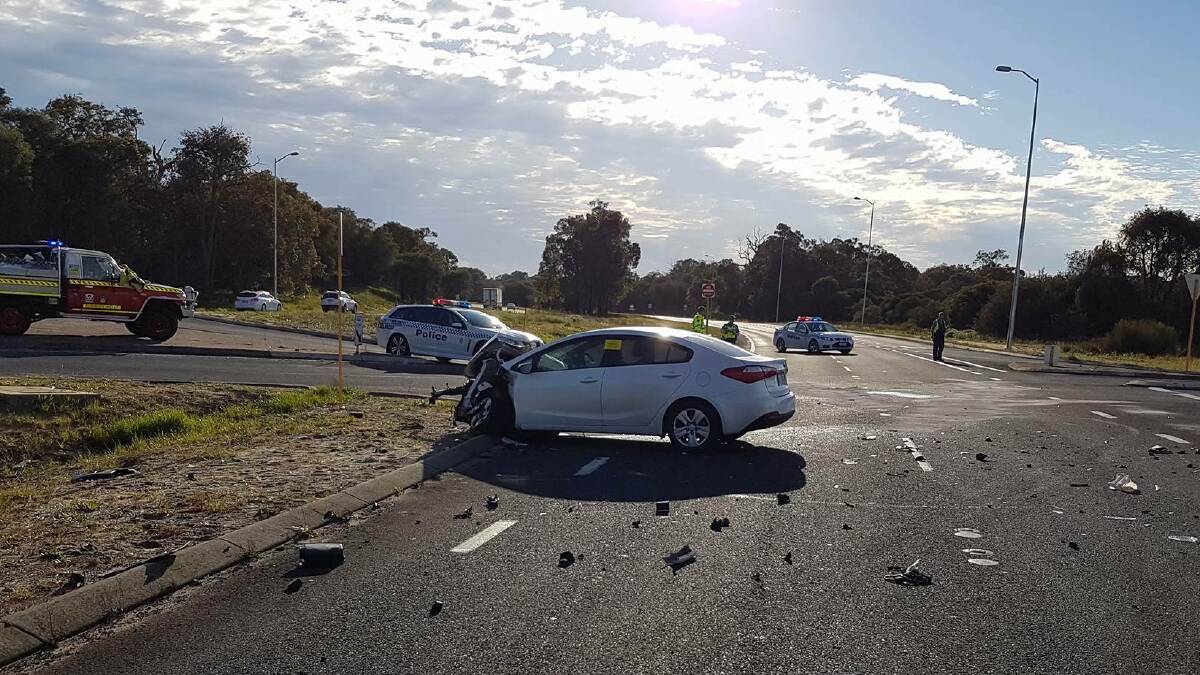 A truck rolled on Forrest Highway in Eaton on Friday morning. It is believed the truck collided with a car. Photo: Jason Wilkinson
