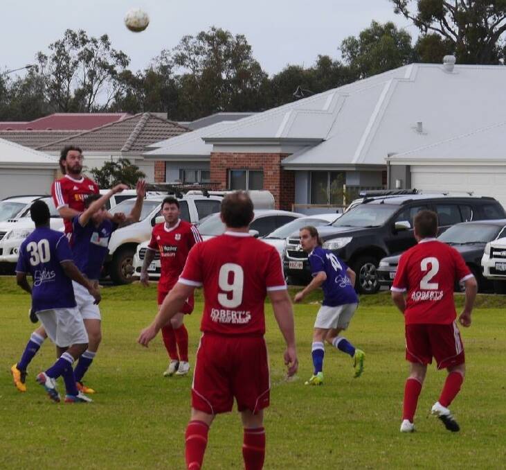 In flight: Dalyellup Park Rangers scored a resounding 14-2 win over Busselton in their master's division clash on Sunday. Photo: Jon Wright.