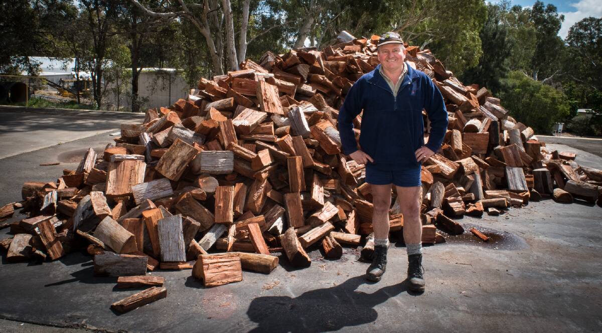 Donation: Forest Product's Commission's Steve Davis has helped organise 25 tonnes of firewood to keep families in Yarloop warm while they rebuild. Photo: Jeremy Hedley.