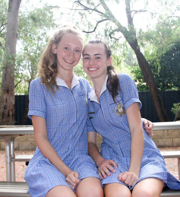 Amber Anderson (left) with friend and fellow Bunbury Cathedral Grammar student Mimi McInerney. Photo: Supplied
