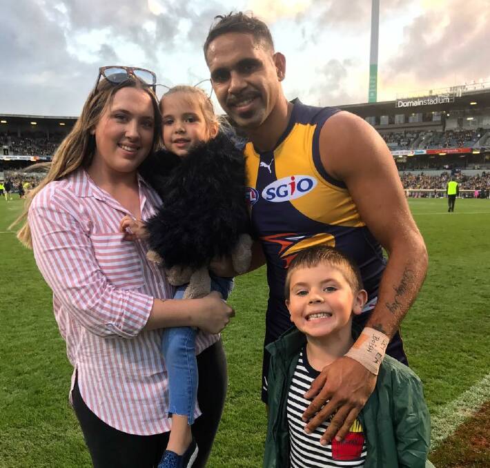 Lewis Jetta and his family at Domain Stadium for his 150th game. Photo: West Coast Eagles/Facebook.