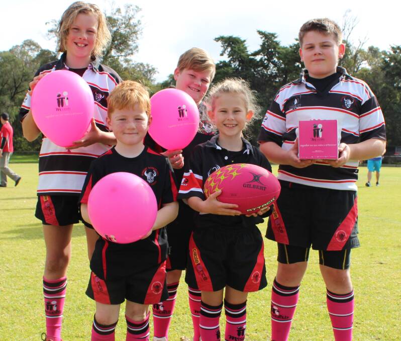 Charity support: Bunbury Barbarians junior rugby club players Ned Gualter, Ike Anderson, Kaden McDonald, Amy Hunter and Gareth Edwards will wear special pink socks this weekend in support of the McGrath Foundation.