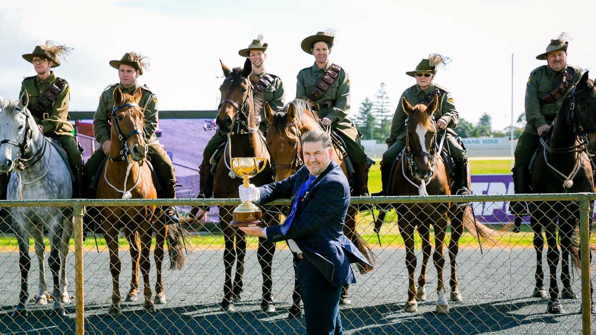 Former Melbourne Cup jockey Wayne Harris and the 10th Light Horse - Bunbury Troop accompanied the 2016 trophy on a tour of Bunbury in August. Photo: Ashley Pearce.