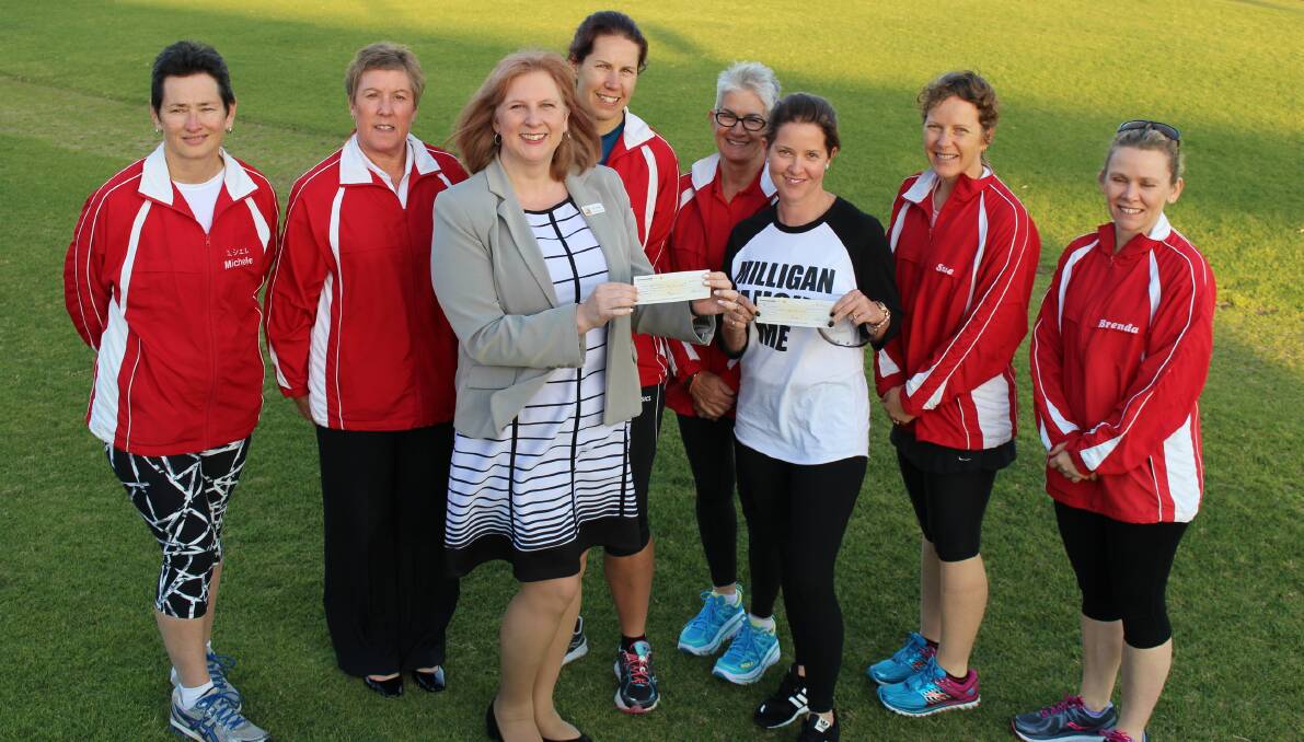 The ladies of the Women's Fun Run committee present cheques to South West Refuge CEO Anita Shortland and Nixi support worker Kel Bradley. 