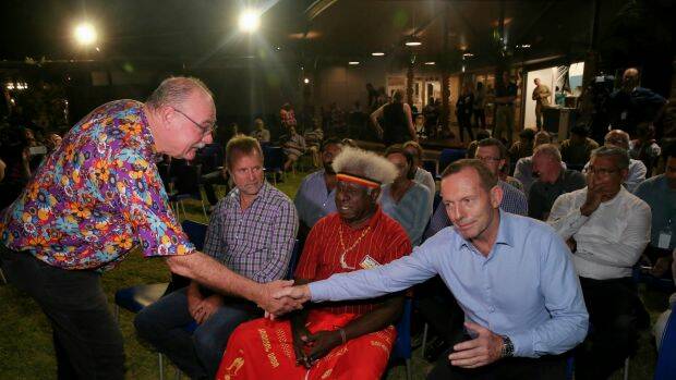 Warren Entsch greets then prime minister Tony Abbott at a cultural celebration on Thursday Island in 2015.  Photo: Alex Ellinghausen
