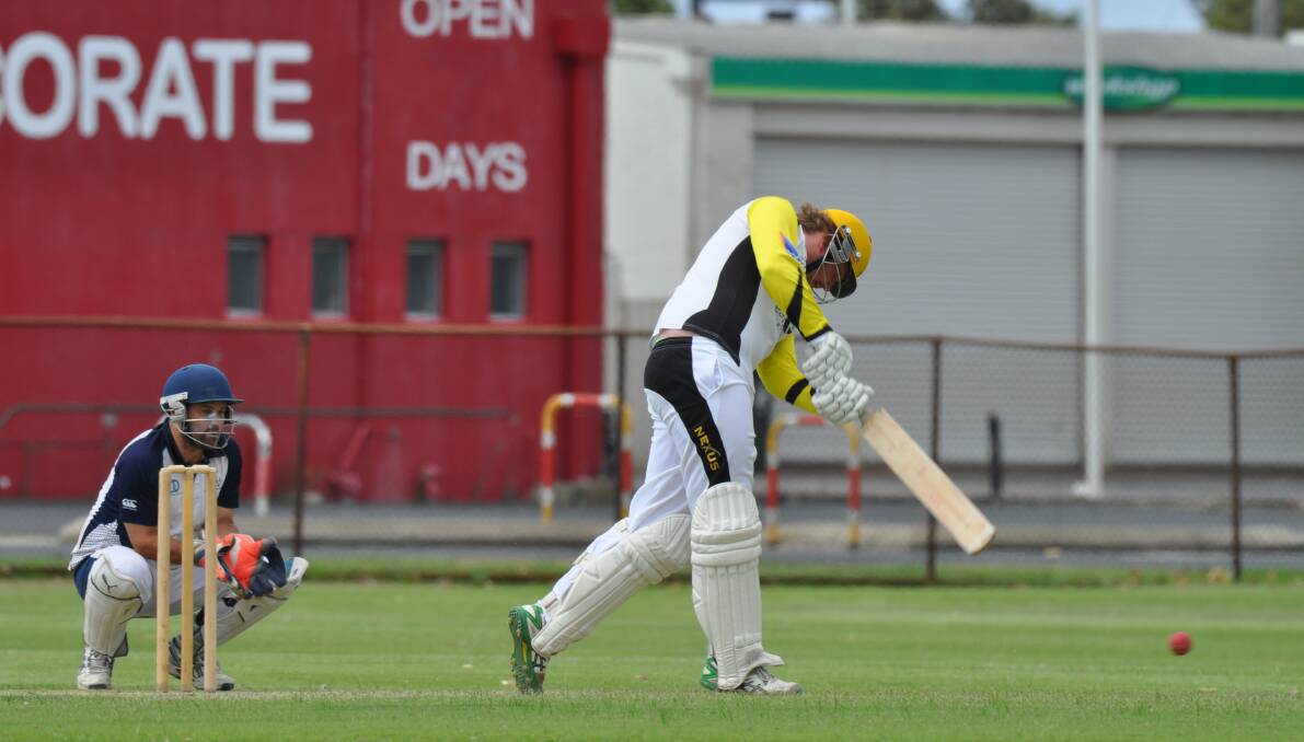 In yellow: Blaze Rosinski starred in Colts' one-wicket victory over Marist in Saturday's preliminary final. Photo: Thomas Munday.