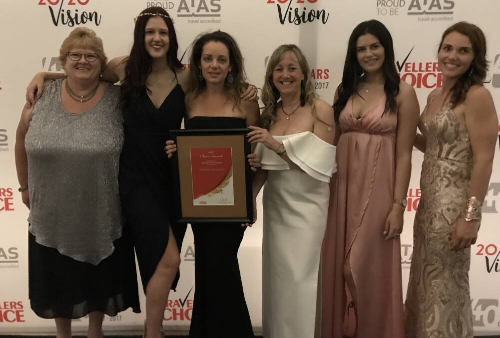 Winners and grinners: Australind Travel and Cruise Centre representatives collected the Bronze Choice Award last month. Photo: Supplied. 