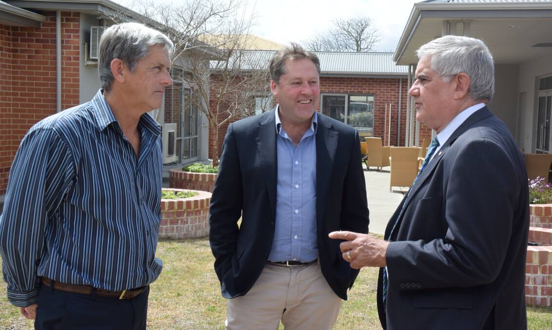 Region focus: Neil Martin, Rick Wilson and Ken Wyatt discussing ValleyView Residence's services. Photo: Thomas Munday. 