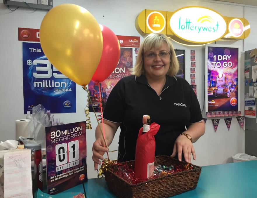 Wealth and happiness: Nextra Bunbury owner Belinda Jefferies is excited for the winner of Wednesday's $1 million Lotterywest draw. Photo: Thomas Munday. 