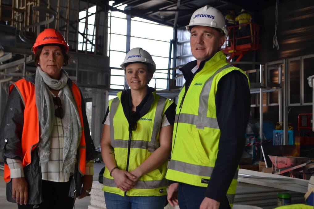 In development: Bunbury Development Committee chairperson Robyn Fenech, Perkins Builders HSCQ officer Dannika Walker, and Perkins Builders project manager Jaco Bosman were thrilled to discuss the Dolphin Discovery Centre project. Photo: Thomas Munday. 