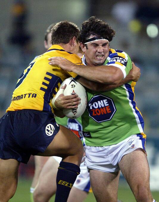 Canberra Raiders v Parramatta Eels at Canberra Stadium in April 2004. Pictured is The Raiders Ian Hindmarsh breaking through The Eels defence. Photo: Pat Scala