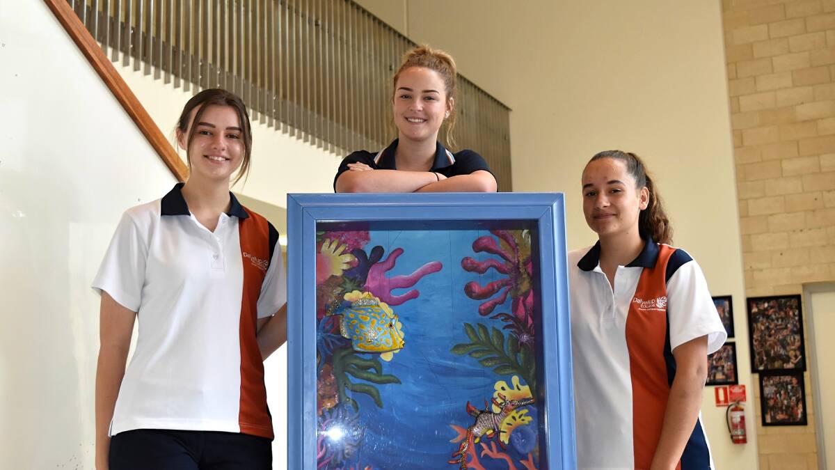 Underwater theme for Children's Ward: Dalyellup College art students Kasey Oldham, 16, Jess Guiness,16, and Alysha Pelucey,16, with their 3D creation ready for Bunbury Regional Hospital. Picture: Emily Sharp