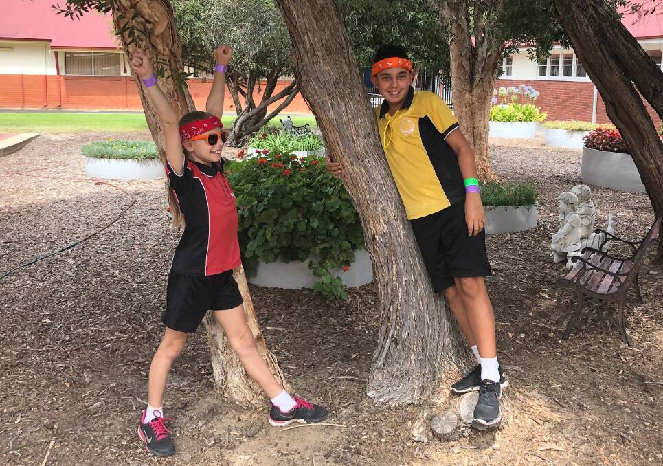 Colour run for coding fun: Harvey Primary School Year 6 students Lily Anzelino and Jesiah Francis are ready for the fun run on February 24. Photo supplied. 