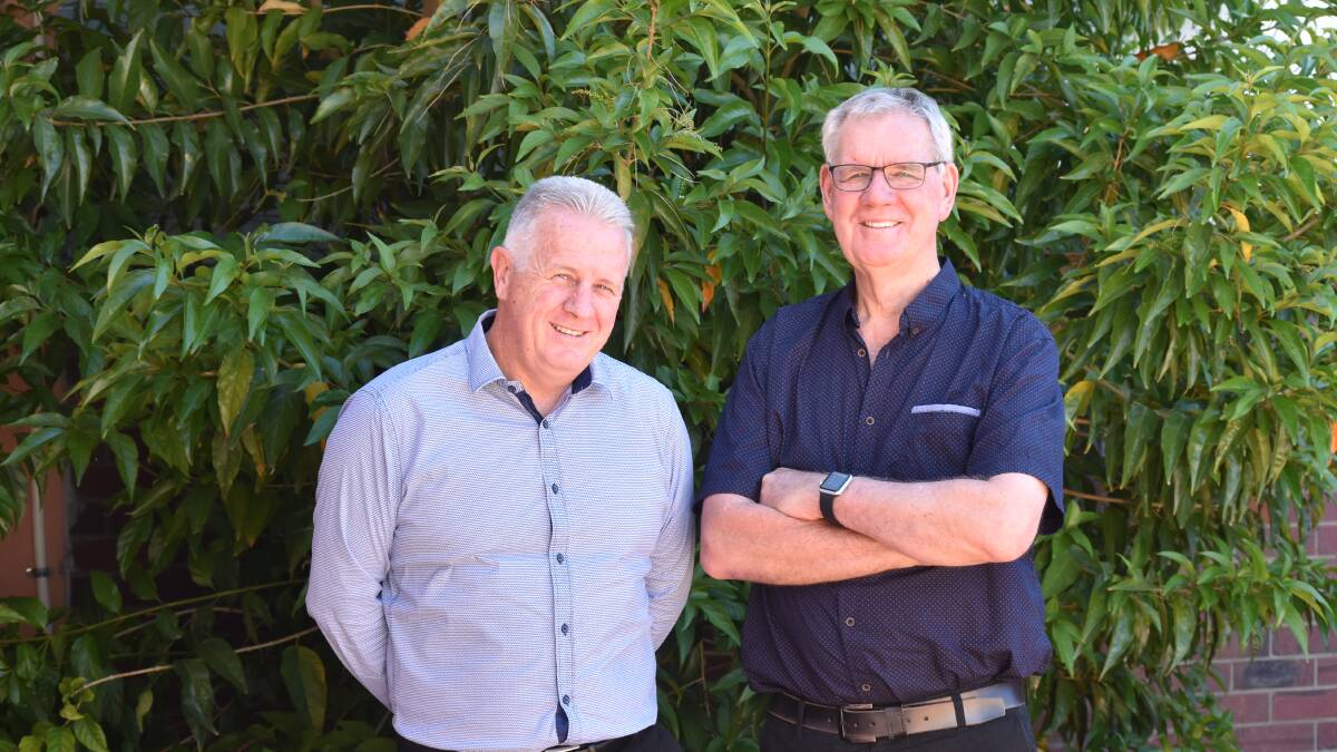 Passing the baton on: Future Bunbury Geographe Chamber of Commerce & Industry chief executive Mark Seaward with retiring chief executive Ray Philp. Picture: Emily Sharp