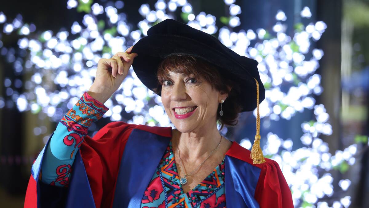 Recognition: Author Kathy Lette was awarded an Honorary Doctorate of Letters by UOW on Thursday for her successful writing career. Picture: Robert Peet