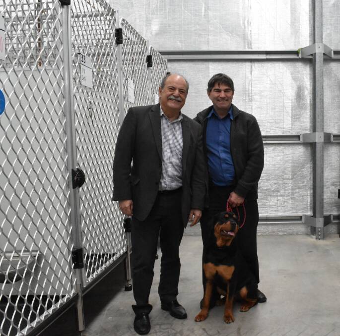Modern pound: Bunbury MLA John Castrilli opened the new regional animal shelter on Tuesday. Pictured also: Mr John Kowal with his furry friend Rosie. 