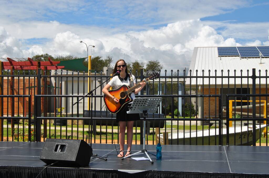 Attendees at St Joseph's Primary School Family Fun Day will be treated to the sweet tunes and musicality of talented guitarist and singer Elavina Williams. Photo: Supplied  
