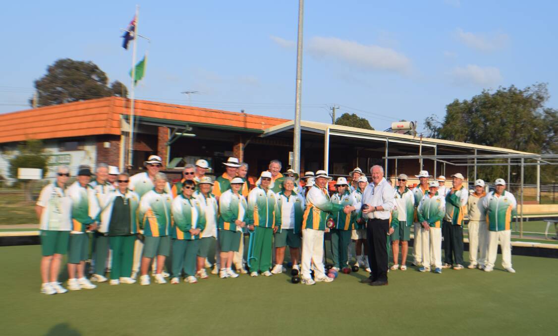 Mick Murray presenting the grant at the Capel Bowls opening day. Photo by Gemma Lloyd.