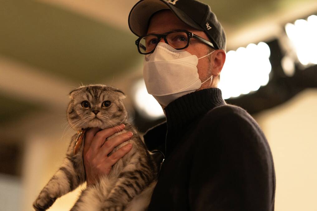 Filmmaker Matthew Vaughn on the set of Argylle, with his and Claudia Schiffer's cat, Chip. The cat is Elly Conway's pet in the film. Picture Apple TV+