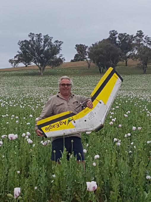 BLOOMING INDUSTRY: David Forsyth on his Cootamundra farm with a TPI Enterprises drone for crop mapping. Picture: Contributed