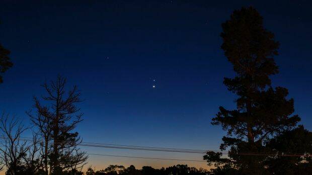 This image, taken in Brisbane in 2016, shows a Jupiter-Venus conjunction, with Venus the lower star in the centre of the image. This year's conjunction will bring the two even closer together in our sky. Photo: Peter Lieverdink / Flickr