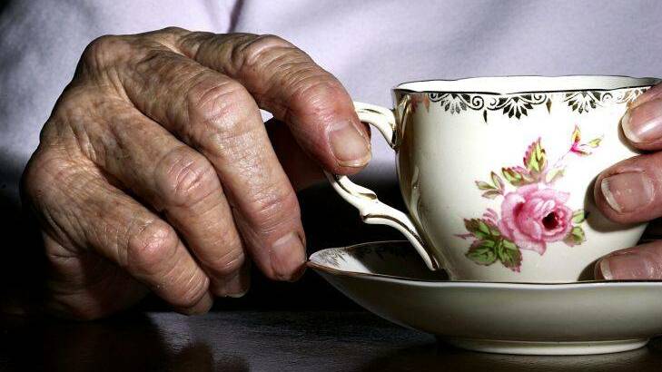 AFR FIRST USE ONLY. old age generic for afr --- generic health , retirement , elderly , nursing homes , aged care , home care. Photo by ROB HOMER SPECIALX 60305 holding a cup and saucer
