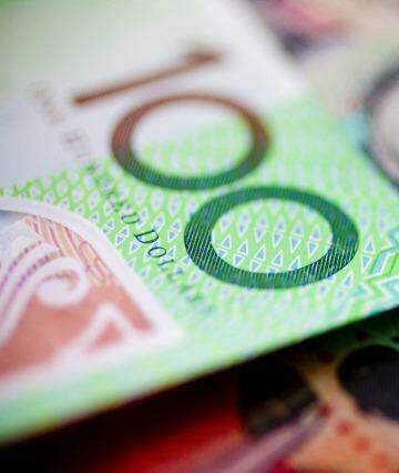 Global factors are likely to keep the Australian dollar under pressure.  Photo: Glenn Hunt