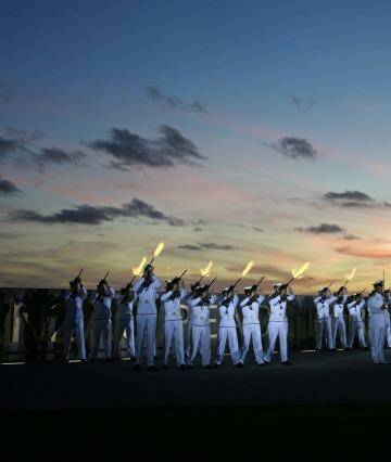 Crew of the Royal Australian Navy ship HMAS Stirling participate in dawn commemorations marking 100 years since the first Anzac (Australian and New Zealand Army Corp) troops departed for Turkey and the Western Front in World War I at Anzac Peace Park in the Western Australian city of Albany on Saturday. Photo: Australian Defence Force