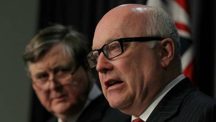 ASIO chief David Irvine and Attorney-General Senator George Brandis are proposing new laws that would threaten ASIO whistleblowers and journalists with up to 10 years jail. Photo: Alex Ellinghausen