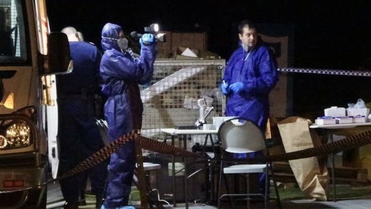 Forensic officers at the crime scene in Yanchep. Photo: Graeme Powell / ABC News