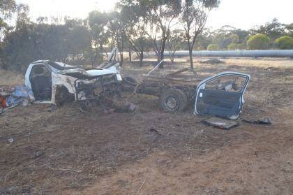 The crash tore the ute into two pieces, trapping the driver in the can section. Photo: WA Police