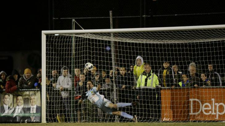 The game-winning save by South Springvale goalkeeper Rani Dowisha. Photo: Graeme Furlong, FFV