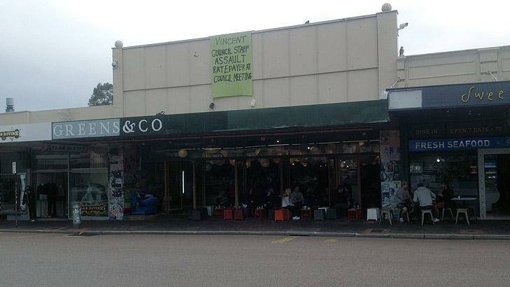 The sign hanging off Greens & Co after the incident at Vincent Council. Photo: David Prestipino