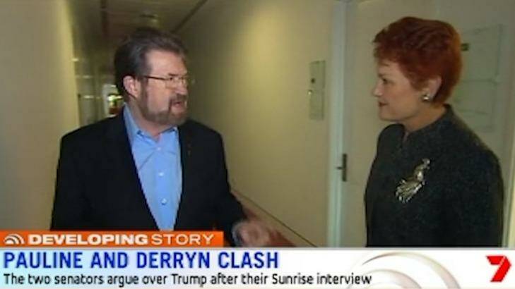 Derryn Hinch and Pauline Hanson continue their argument into the corridors on Monday. Photo: Channel 7