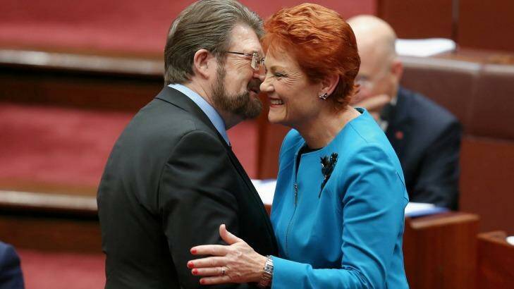 Senator Pauline Hanson is congratulated by Senator Derryn Hinch after delivering her first speech in the Senate last month. Photo: Alex Ellinghausen