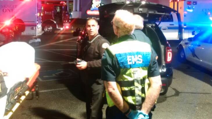 Paramedics outside the Cascade Mall after the fatal shooting. Photo: Washington State Police, Mark Francis