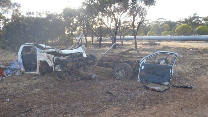 The crash tore the ute into two pieces, trapping the driver in the can section. Photo: WA Police