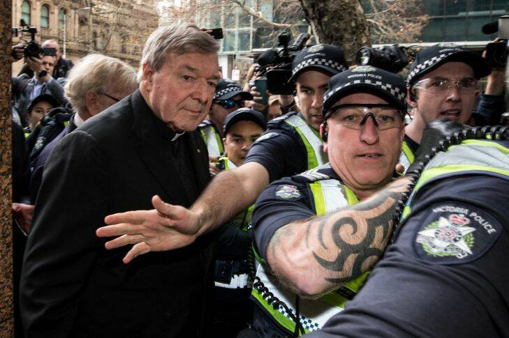 Cardinal George Pell arrives at Melbourne Magistrates Court.  Australia's highest ranking Catholic and one of the most powerful figures in the Vatican, he is facing multiple charges in respect of historic sexual offences, and there are multiple complainants relating to those charges culminating from a two-year investigation by Victoria Police. Wednesday, July 26, 2017. Photo: Jason South