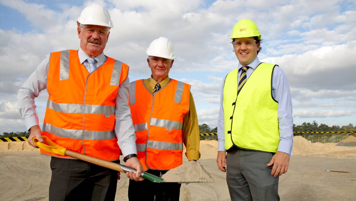 Member for Collie-Preston Mick Murray, Shire of Capel president Murray Scott and Woolworths regional development manager Damon Dimitrijevic at the site of the new Dalyellup shopping complex.