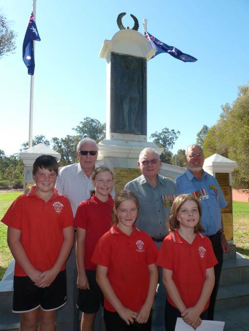 Greenbushes Primary School celebrated Anzac Day with an early ceremony on April 11. Pictures are head students Ben Rodgers, Emma Jackson, Hayley Goodwin and Brianna Bunter with Greenbushes RSL President Ron Adair (centre) and Bridgetown RSL representatives Don Roberts and Phillip Anderson.