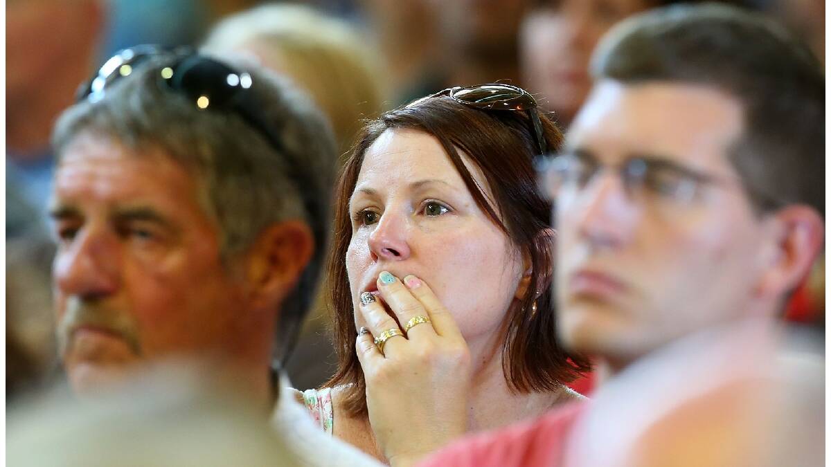 Residents attend a community meeting containing details about a devastating fire which destroyed more than 50 homes in the Perth hills area. Photo: Paul Kane/Getty Images.