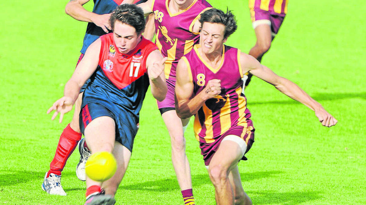 Ethan Hughes, right, playing for Harvey-Brunswick Leschenault in 2013.