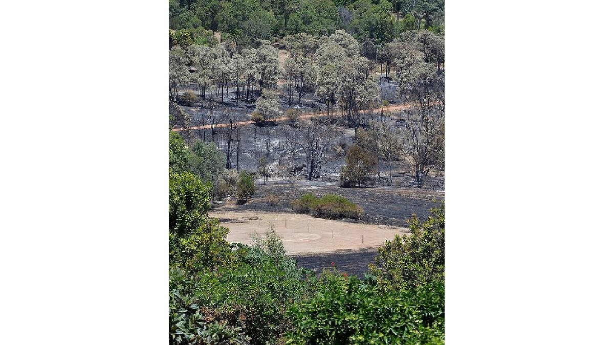 The aftermath of a devastating bushfire in Perth's hills. Photo: DFES.